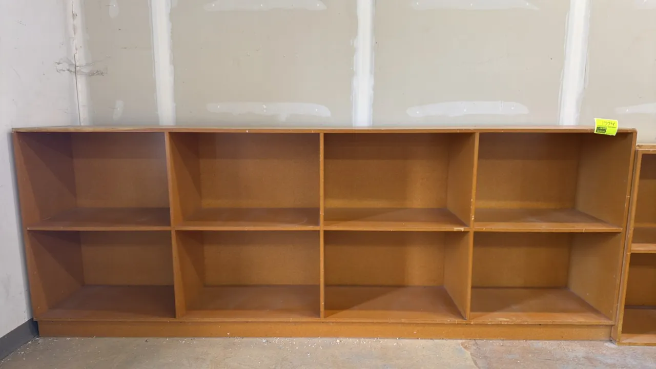 Wood 8-compartment storage cabinet. Features an open front design with eight storage compartments arranged in a two-tier layout. Dimensions: 121"L x 1