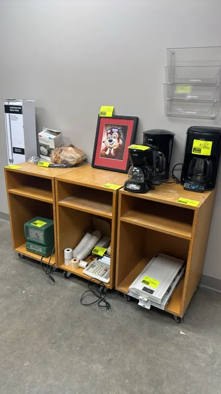 Wood portable cabinets. Features open upper and lower storage compartments. Mounted on casters. Dimensions: 18" x 18" x 31" each. Contents not include