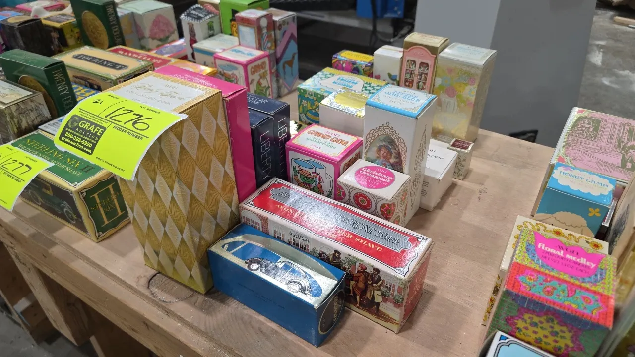 A Collection of Vintage Avon Collector Decanters and Fragrances. (Avon, 1960s-1970s) A 21-piece assortment of novelty decanters, toiletries, and candl