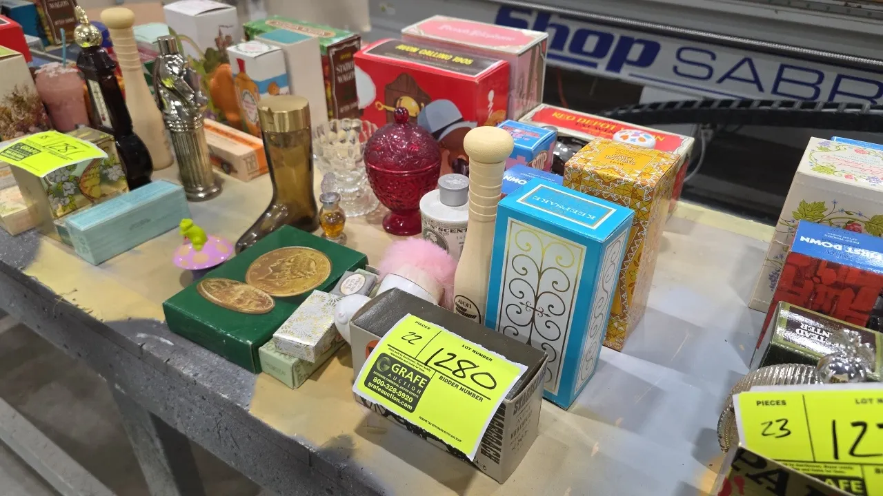 A Collection of Vintage Avon Collector Bottles. (Avon, 1960s-1980s) An assortment of novelty perfume, after shave, and cologne decanters, including fi