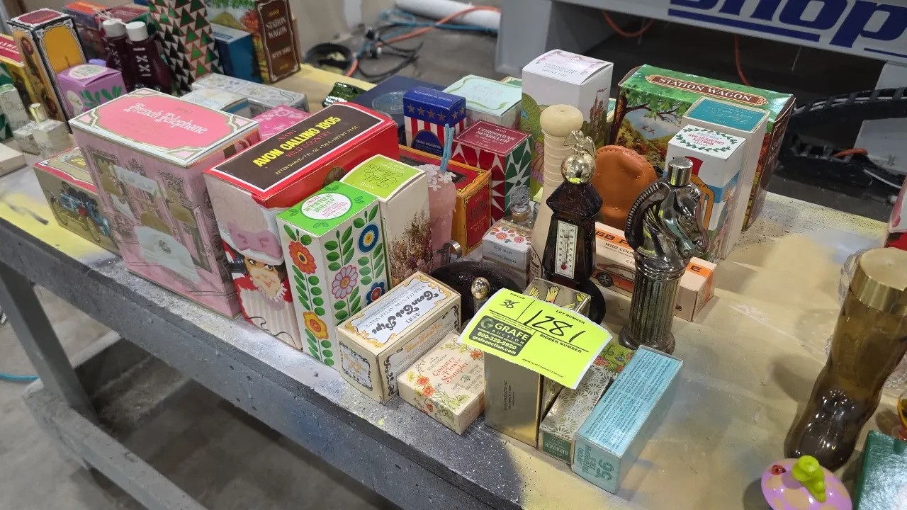 A Collection of Vintage Avon Novelty Perfume Bottles. (Avon, 1960s-1970s) An assortment of novelty cologne and perfume bottles including French Teleph