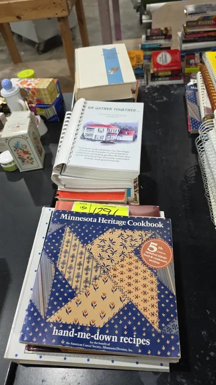 Assorted hardcover, softcover, and spiral-bound cookbooks. Features a variety of general, regional, and brand-name recipes including The Pillsbury Coo