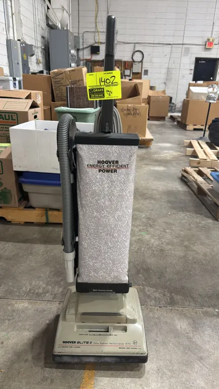 Hoover Elite II upright vacuum cleaner. Features Total System Performance 470, multi-position carpet height adjustment, brushed edge cleaning, stair c