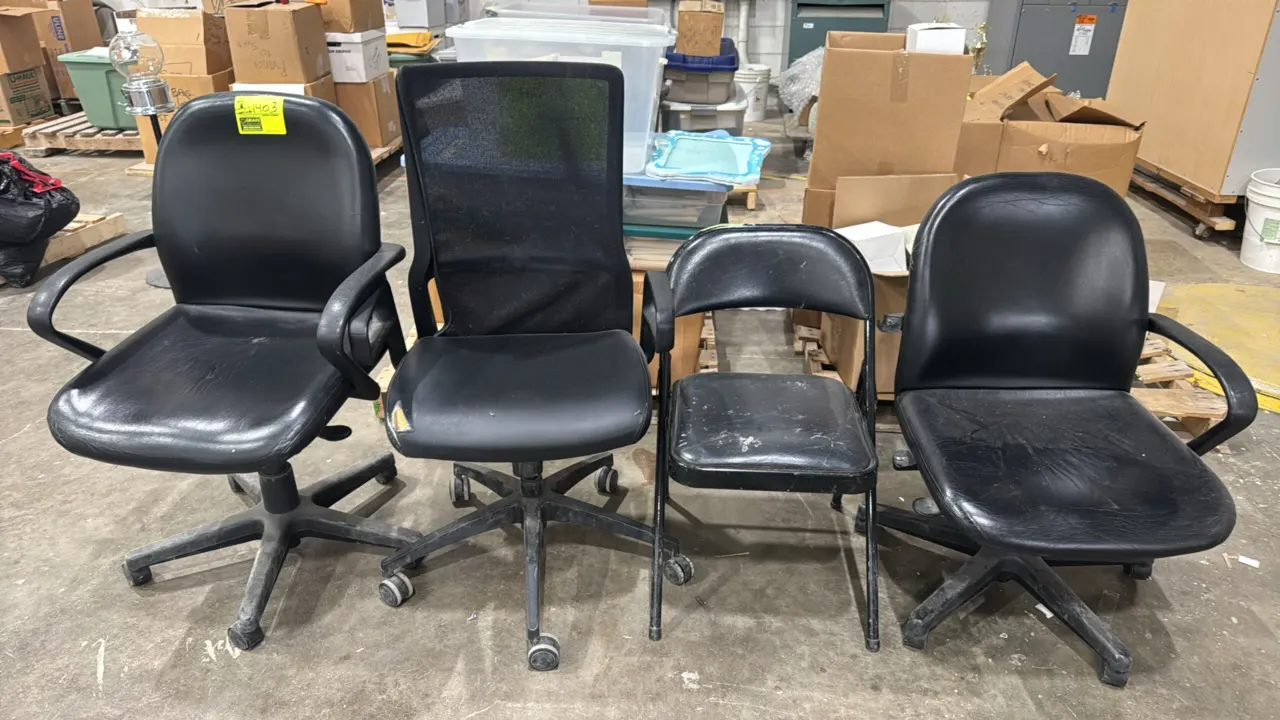 Assorted office and folding chairs. Includes (2) black vinyl swivel armchairs on 5-star caster bases, (1) black mesh-back task chair on casters, and (