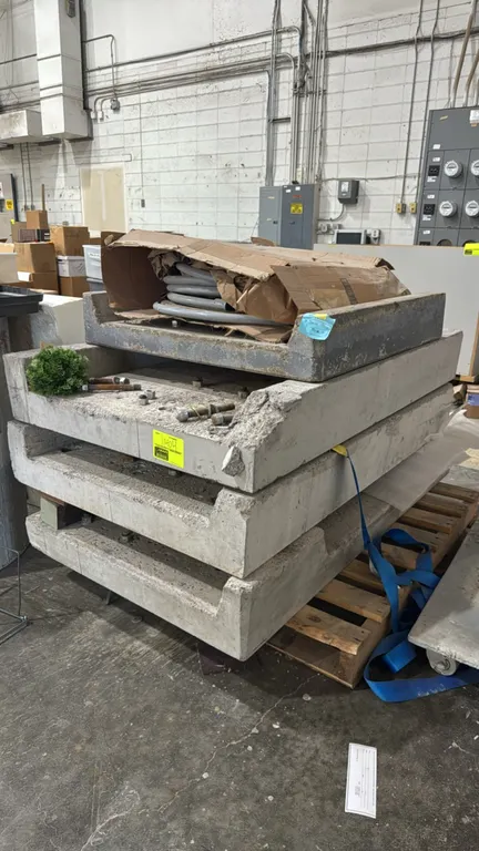 Precast concrete platforms. Features precast concrete construction with recessed center channels. 36"x58". Note: Concrete exhibits significant damage