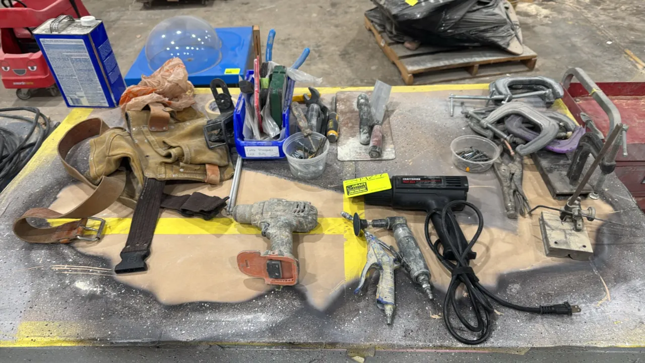 Assorted tools and hardware package lot. Includes Craftsman electric heat gun, pneumatic angle die grinder, air blow gun, cordless drill body, assorte