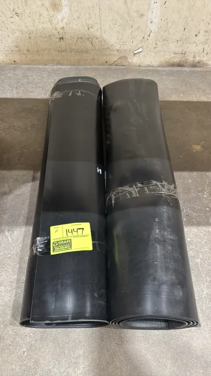 Rubber equipment mats. Features black flexible rubber construction with a textured grip surface. 3'W.