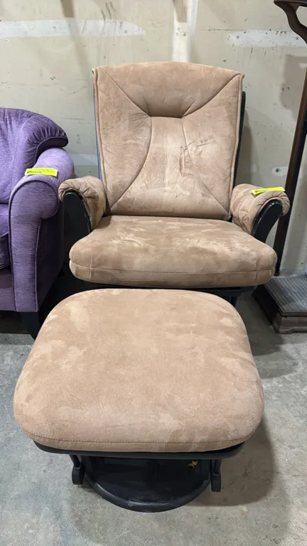Swivel glider rocker with matching ottoman. Features tan microfiber padded upholstery, padded armrests, and a dark finish wood frame. Equipped with a