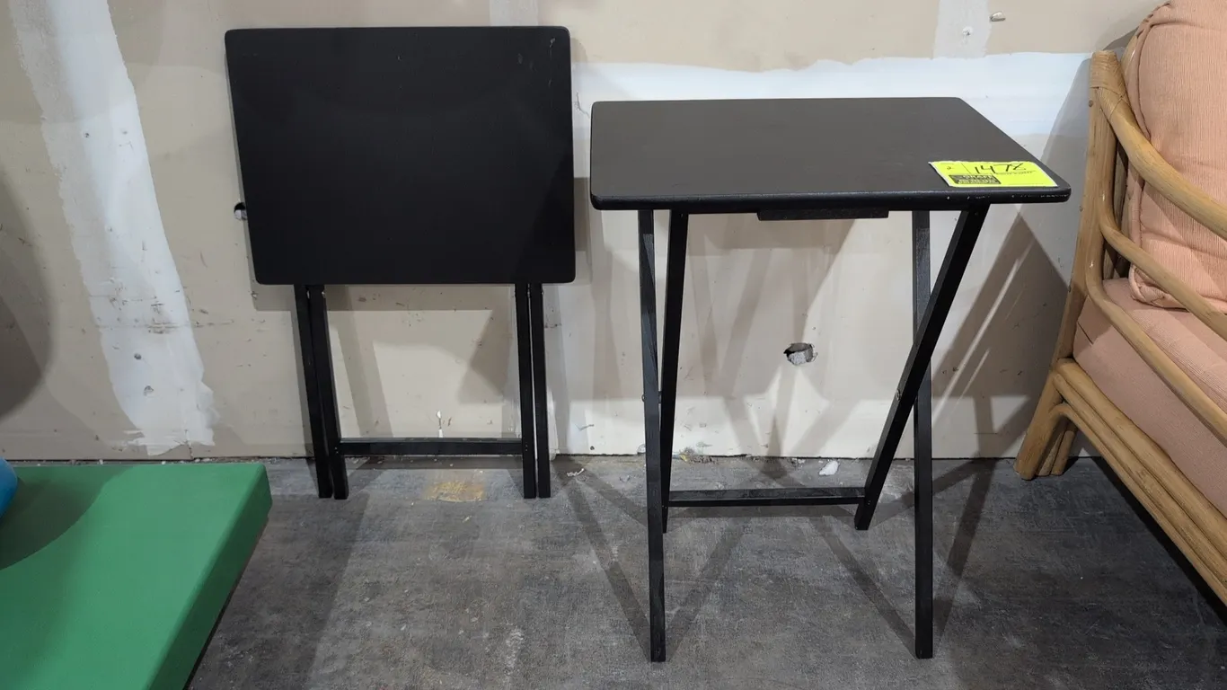 Wood folding tables. Features black finish and folding X-frame legs. 19" x 26"H.