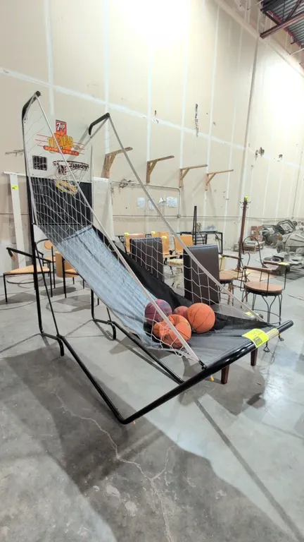The Ultimate Challenge Shot Clock arcade basketball game. Features 7Up 100th Year of Basketball graphic backboard, single rim, electronic scoring disp