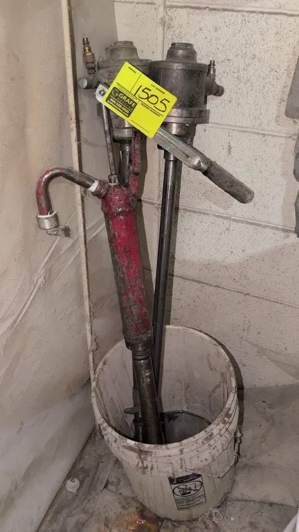 Manual lever-action drum pump and pneumatic transfer pumps. Includes (1) red lever-action manual drum pump with curved discharge spout, (2) pneumatic