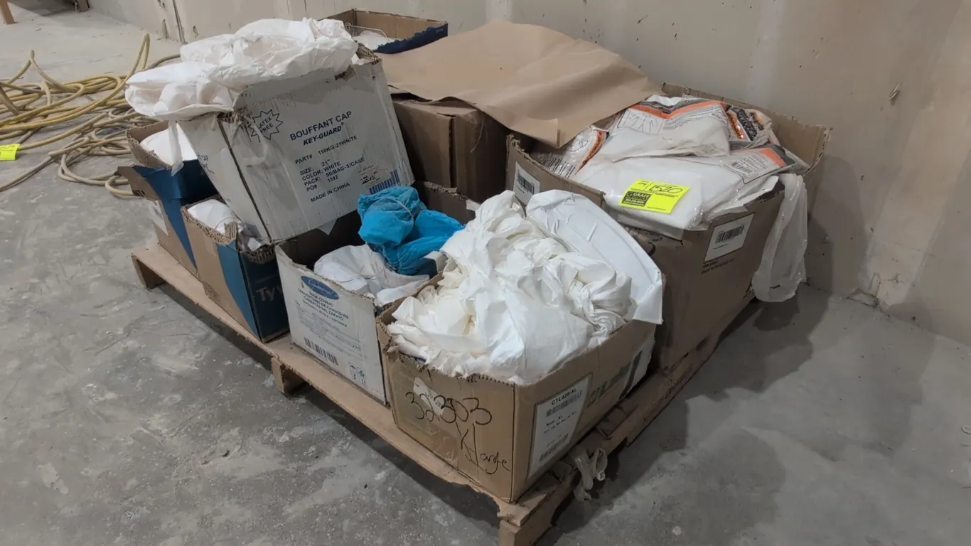 Assorted PPE lot. Includes DuPont Tyvek 400 coveralls, Body Guard microporous coveralls, Key-Guard bouffant caps, Safety Director shoe covers, and 3M