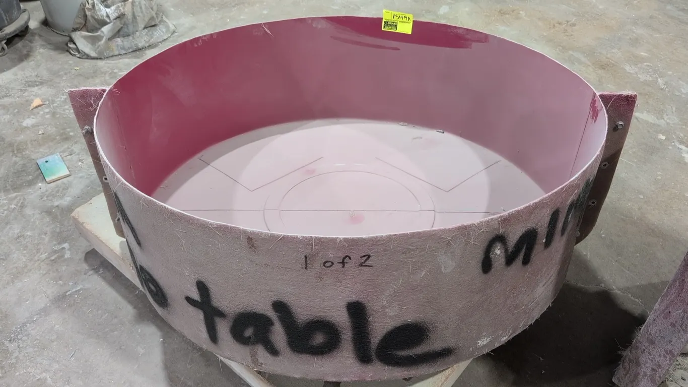 Poly round mold. Features two-piece flanged construction with smooth molded interior surface. Dimensions: 48" x 15".