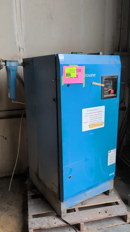 Hydrovane HVFR2B rotary vane air compressor. Features a Hydrovane Pro digital controller with emergency stop, 18.5 kW motor, enclosed cabinet, and ext