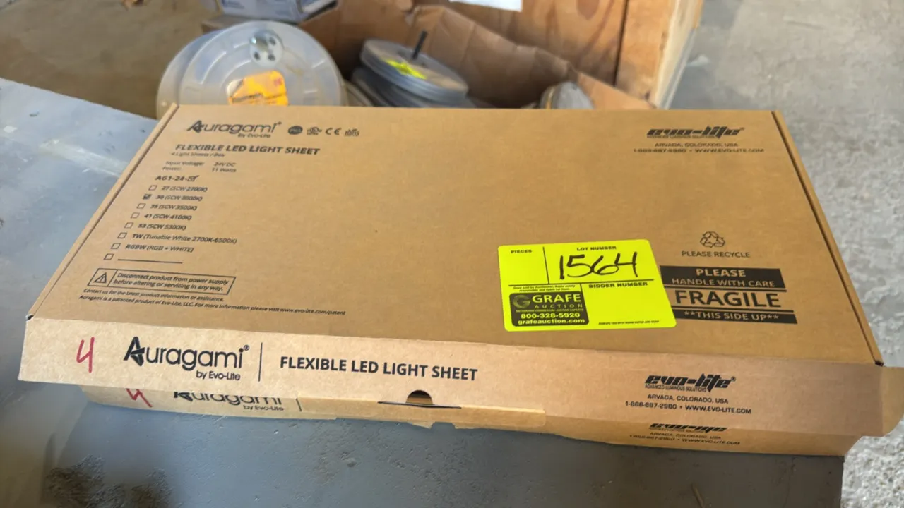 Evo-Lite Auragami AG1-24-30 flexible LED light sheets. Features 3000K single color white lighting and IP65 rating. Packaging indicates 4 sheets per bo
