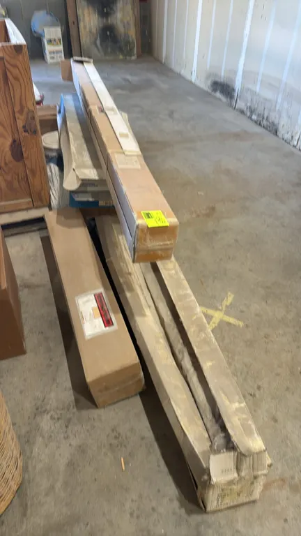 Bulk lot of assorted molding and trim. Includes multiple cartons of architectural molding, featuring white ornate decorative scroll and relief pattern