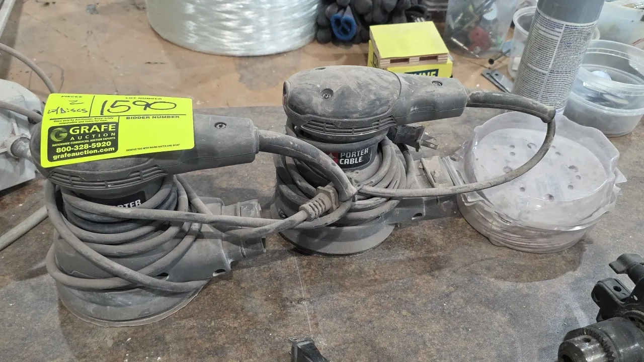 Porter-Cable 343 5" random orbit sanders. Features 5" sanding pads and dust collection ports. Includes assorted sanding discs. Electrical: 120V, 60 Hz