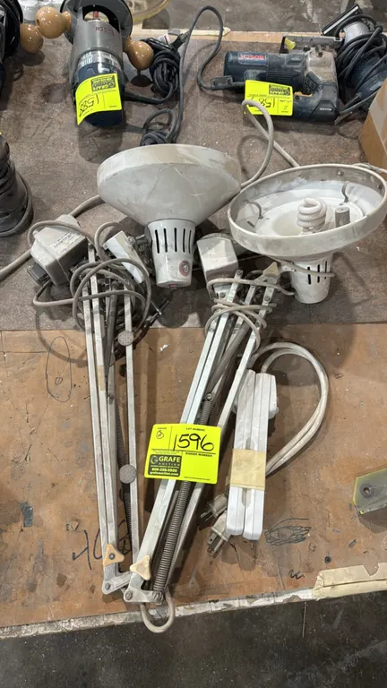 Metal articulating task lamps. Includes (2) swing-arm drafting and work lights. Features spring-balanced adjustable metal arms, flared shades, and mou
