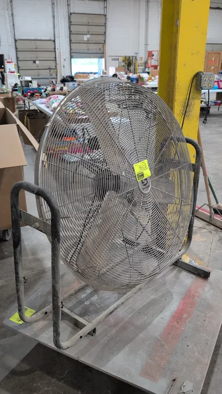 2019 Strongway SFMC-360TH 36" industrial circulator fan. Features a 3-blade design, protective wire cage, and tilt-adjustable positioning. S/N: HE2019