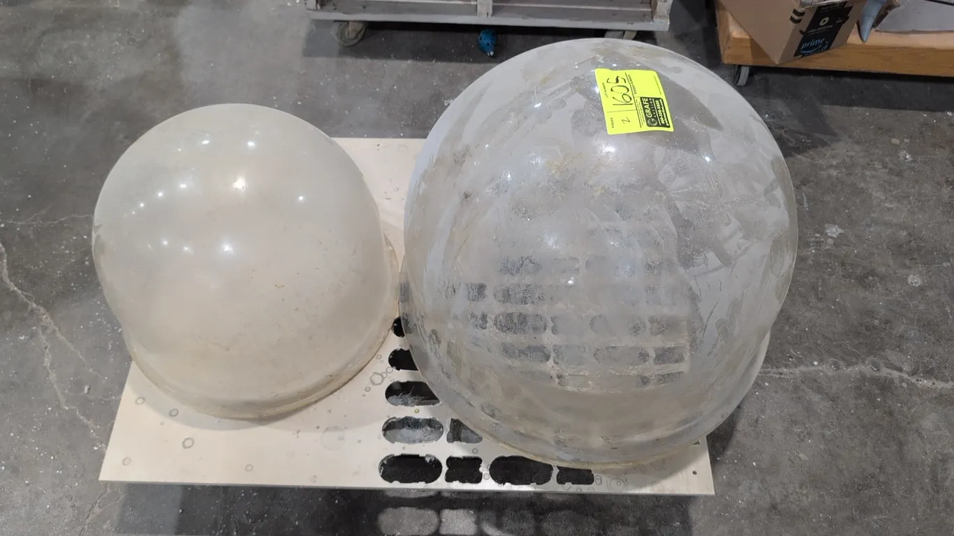 Assorted poly domes. Features molded plastic construction with bottom flanged rims. Includes one clear dome and one translucent dome in assorted sizes