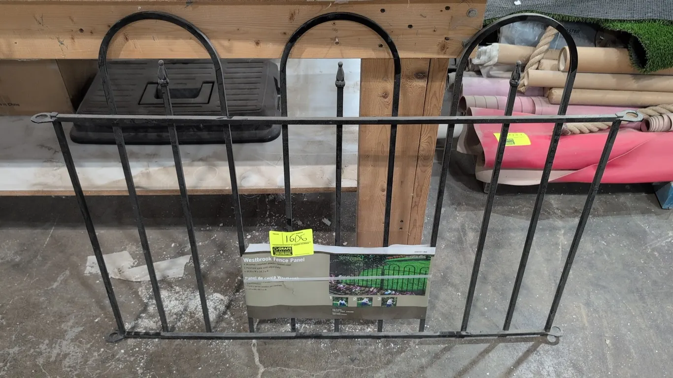 Westbrook decorative metal fence panel. Constructed of weather-resistant powder-coated steel in a black finish. Features an arched top design with dec