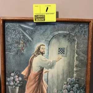 A Framed Print of Jesus Knocking at the Door. (Vicente Roso) A framed religious art print depicting Jesus Christ knocking at a wooden door, after arti