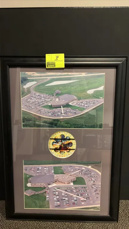 Framed Autumn Ridge Church aerial photograph display. Features two aerial views of the church facility and grounds flanking a central circular depicti