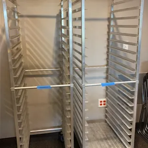 Aluminum front-load channel pan racks. Features aluminum tubular frame construction with channel slide runners. Mounted on swivel casters.