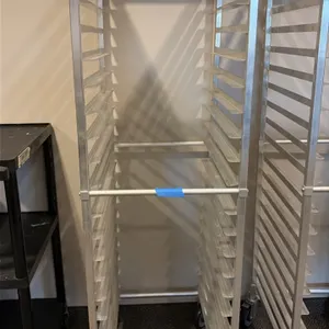 Aluminum front-load pan rack. Features 20-tier angle runners for sheet pans. Mounted on swivel casters.