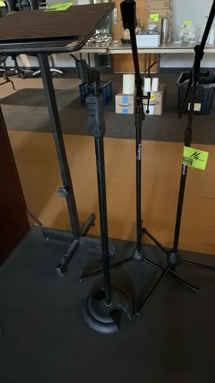 On-Stage Stands and Hercules adjustable microphone stands. Includes tripod boom stands and a straight stand with a weighted cast base. Features adjust