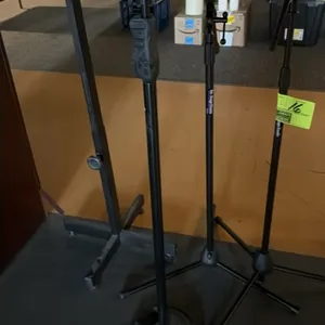 On-Stage Stands and Hercules adjustable microphone stands. Includes tripod boom stands and a straight stand with a weighted cast base. Features adjust