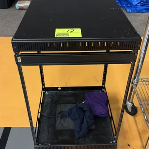 Metal equipment rack cart. Features an open-frame design with rack mounting rails, solid top surface, and lower shelf. 20" x 19". Mounted on swivel ca