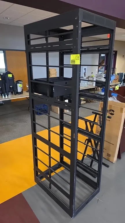 Middle Atlantic Products VRK-44-31H electronics rack. Features open-frame steel construction, pull-out equipment tray with front handle, and integrate