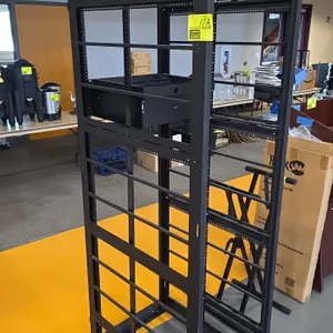 Middle Atlantic Products VRK-44-31H electronics rack. Features open-frame steel construction, pull-out equipment tray with front handle, and integrate