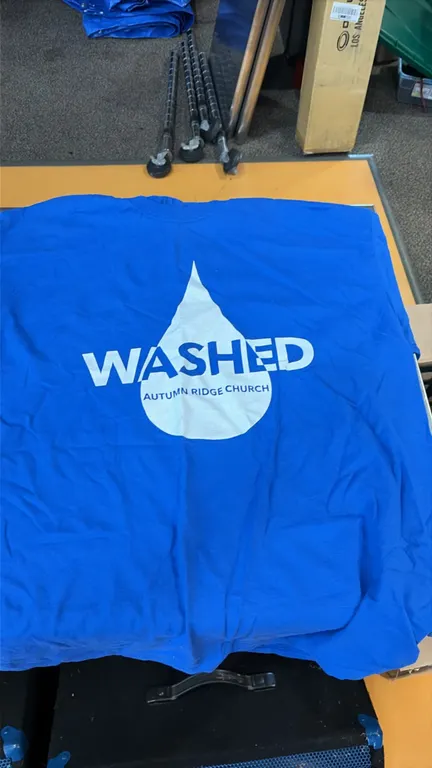 Autumn Ridge Church graphic T-shirts. Includes royal blue "WASHED Autumn Ridge Church" and navy "I'm All In!" designs. Sizes include Small, Large, and