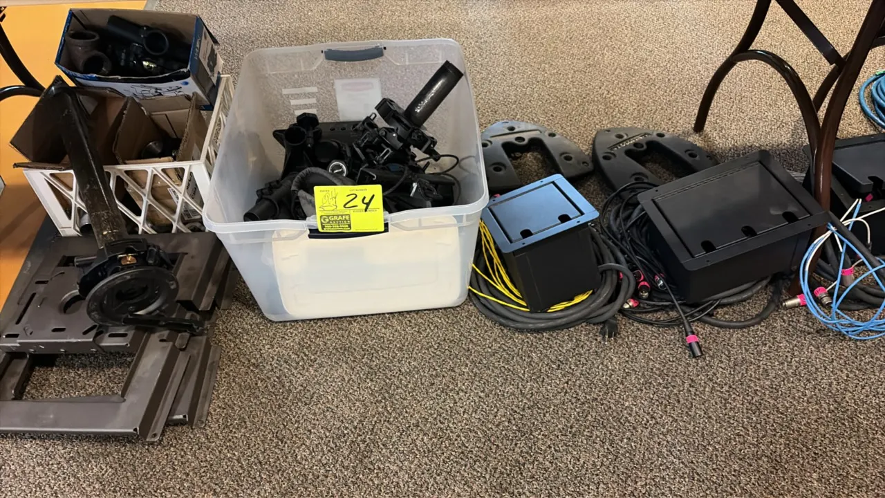 Assorted stage audio equipment and mounting hardware. Includes hinged stage floor pocket boxes with XLR connectors and duplex AC outlets, cabling, mic
