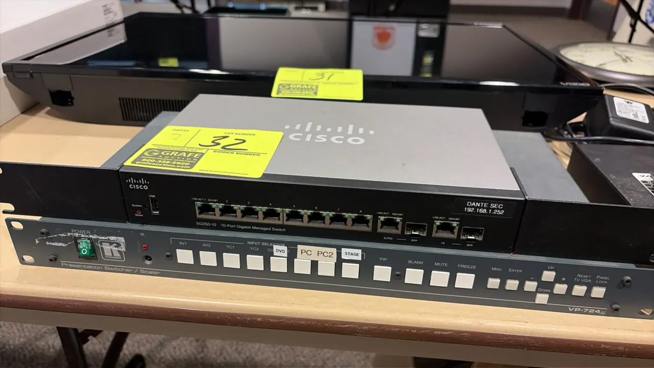 Cisco SG350-10 and Kramer VP-724xl AV equipment lot. Includes a Cisco SG350-10 10-port gigabit managed switch and a Kramer VP-724xl presentation switc