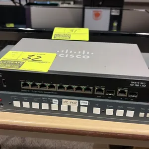 Cisco SG350-10 and Kramer VP-724xl AV equipment lot. Includes a Cisco SG350-10 10-port gigabit managed switch and a Kramer VP-724xl presentation switc