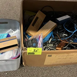 Assorted cords, cables, and miscellaneous electronic accessories. Includes audio and XLR cables, Ethernet patch cables, power cords, surge protector s