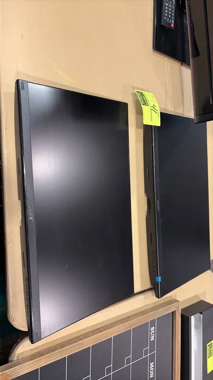 Acer 24" flatscreen monitors. Features widescreen display, slim bezel design, and integrated controls. Black finish. Note: Stands and cables not inclu