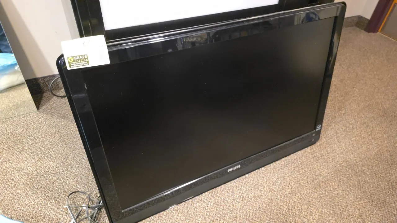 2009 Philips 42PFL3603D/F7 42" LCD television. Features HDMI, component video, composite AV, and S-video inputs. S/N: YA1A0907010906. Electrical: 110-