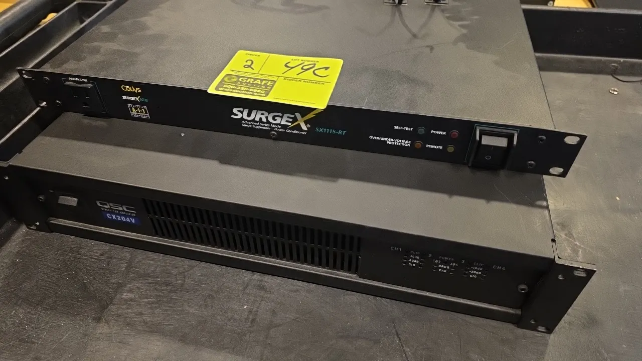 Audio equipment lot. Includes (1) SurgeX SX1115-RT surge suppressor/power conditioner and (1) QSC CX204V 4-channel direct 70V power amplifier. Feature