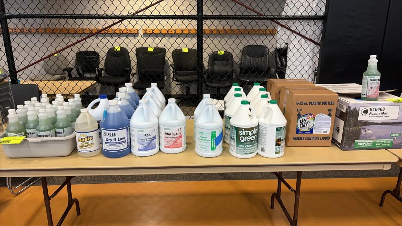 Assorted commercial cleaning supplies. Includes Simple Green industrial cleaner and degreaser, Multi-Clean Foamy Mac restroom cleaner bottles and boxe