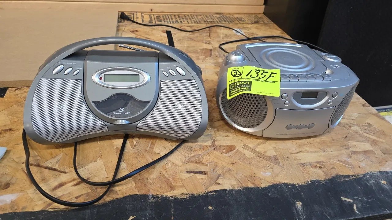Portable boombox lot. Includes (1) 2009 GPX BCD2306DP CD boombox with digital AM/FM radio, and (1) Trutech T250-B CD stereo radio cassette recorder. F