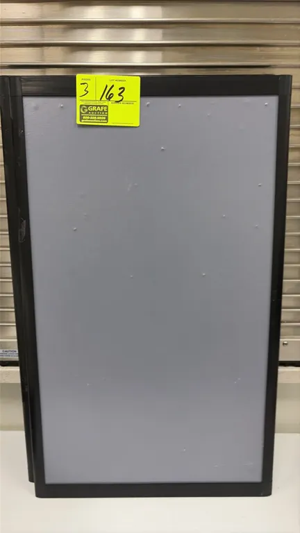 Sign boards. Features black frames with gray display panels. 24".