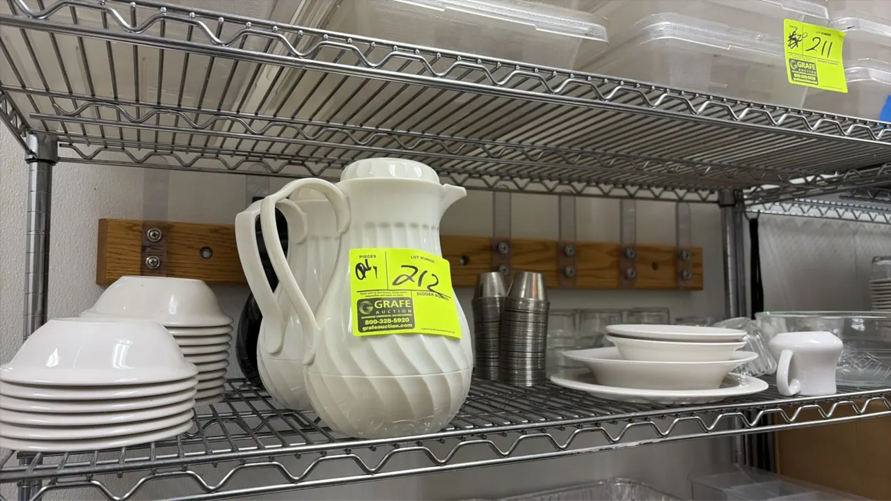 Assorted food service wares and dinnerware. Includes insulated beverage carafes, ceramic plates and bowls, stainless steel portion cups, glassware, a