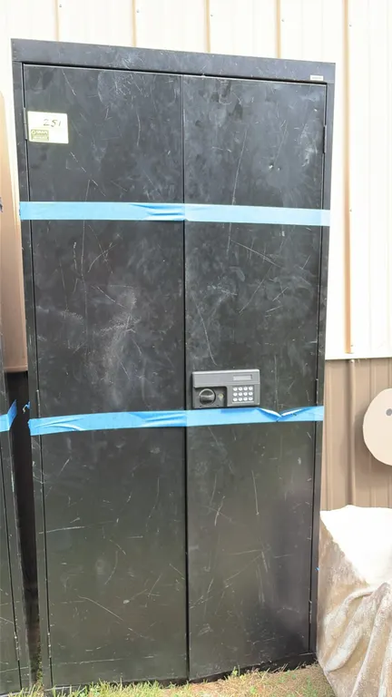 Metal 2-door storage cabinet. Features an electronic digital keypad lock with turn handle. Finished in black. Note: Key and combination are not includ