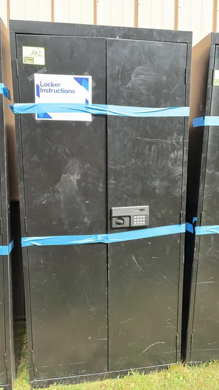 Metal two-door storage cabinets. Features double doors, electronic digital keypad locks with turn knobs, and a black finish. Note: Keys and combinatio