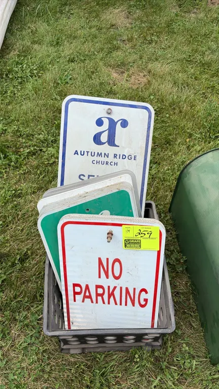 Assorted metal parking and directional signs. Includes 'NO PARKING' and church property signs. Features aluminum construction with pre-drilled mountin