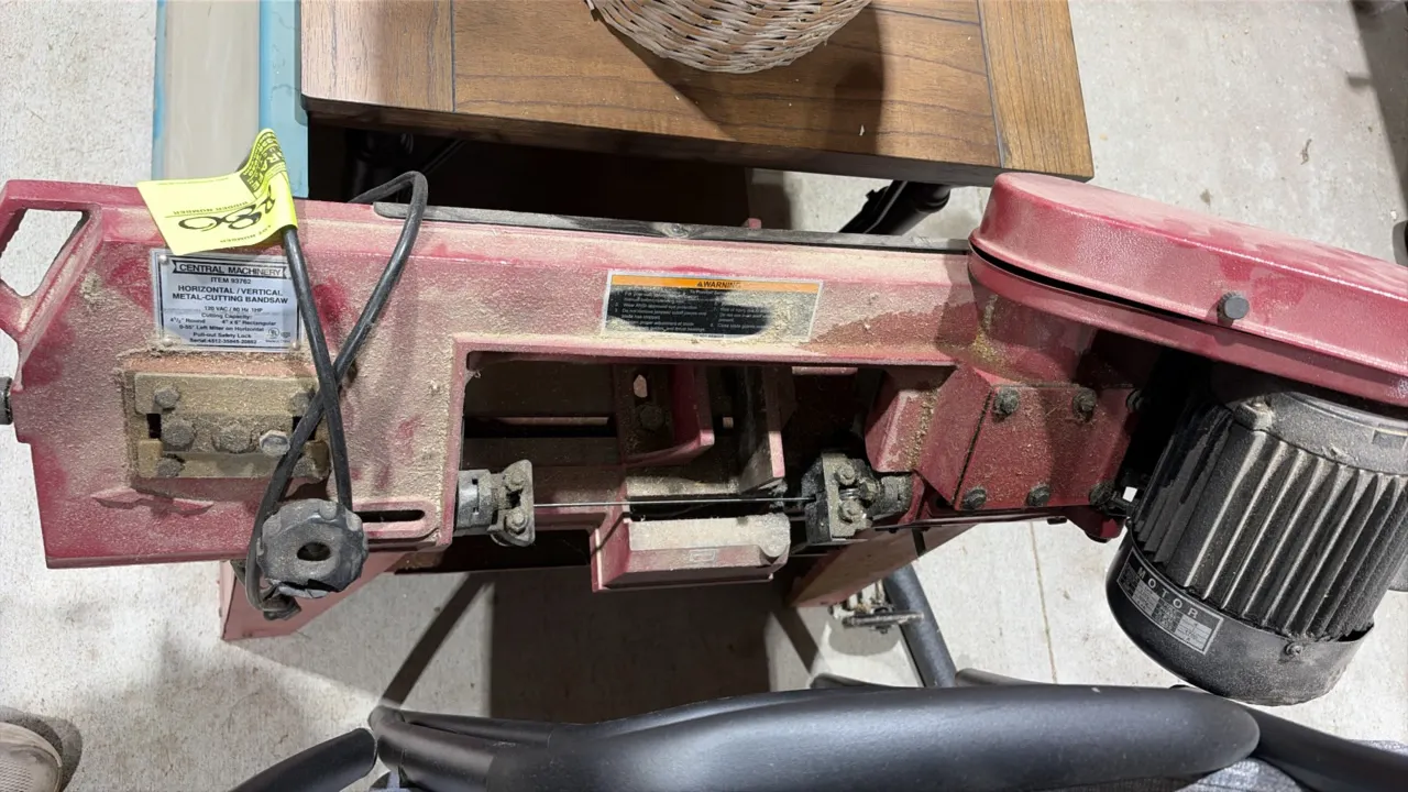 Central Machinery 93762 horizontal/vertical metal-cutting bandsaw. Features 4-1/2" round and 4" x 6" rectangular cutting capacity, 0-55° left miter on